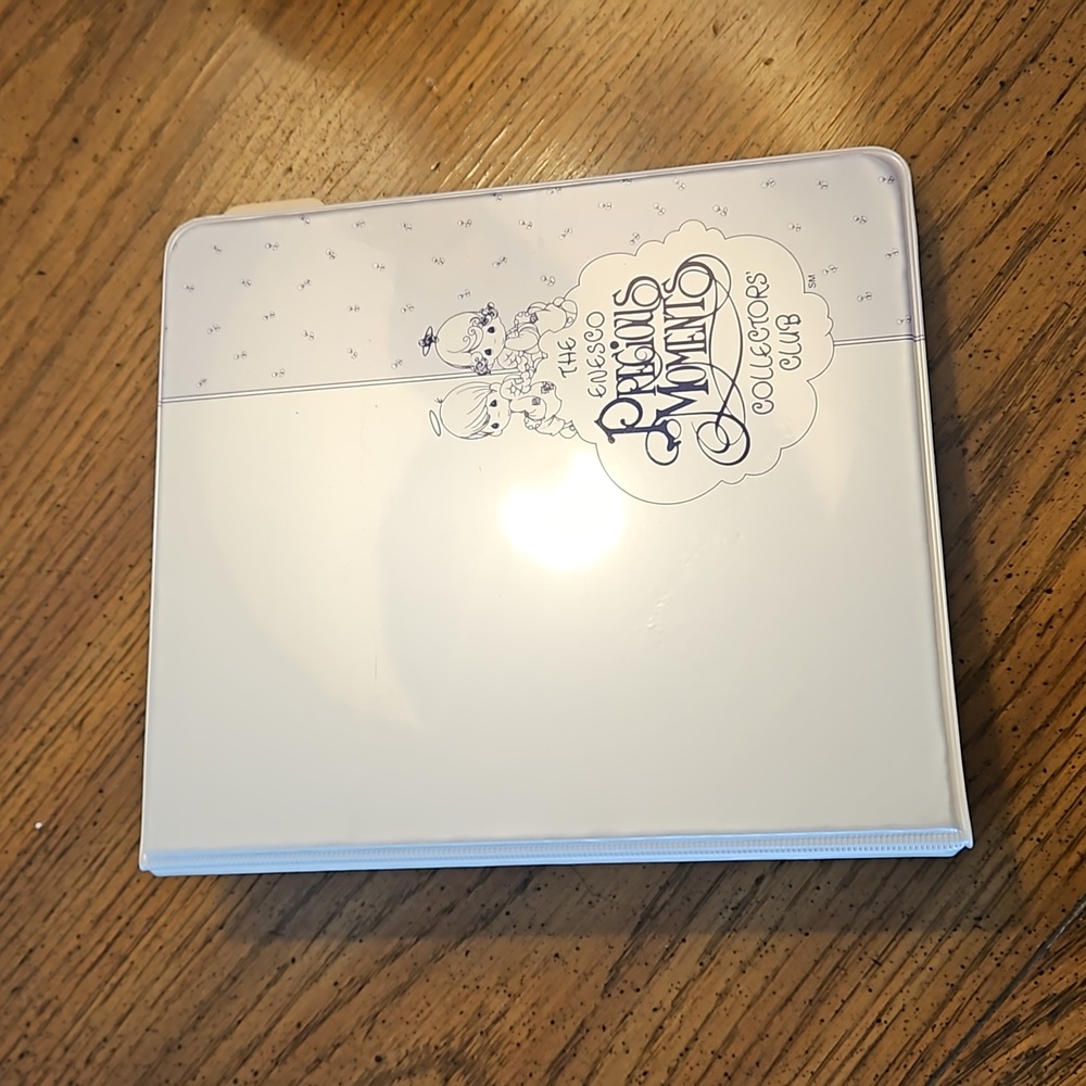 Precious Moments collectors club registry binder.